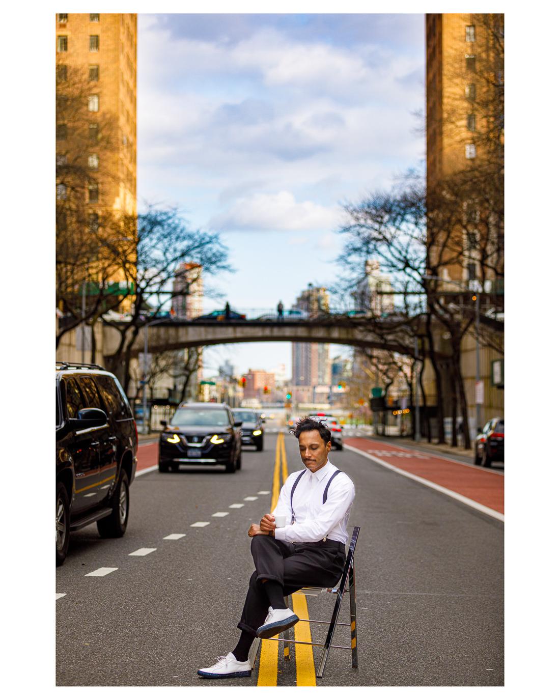 Shaun sitting on a chair in the middle of 42nd Street